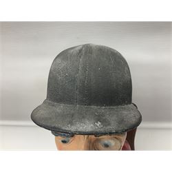 Composite figure of the head of a huntsman on a shield 'Caught by the Fox', D28cm