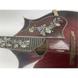 Eastern eight-string mandolin with sunburst finish and mother-of-pearl inlay L68.5cm; and another Harmony mandolin with cracked headstock (2)