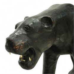 Early 20th century leather-covered decorative model of a Panther in a naturalistic stance, prowling forward with arched back, lowered head, and extended tail, open jaws revealing teeth and fangs with nylon whiskers