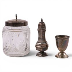 Silver egg cup, pepper shaker and cut glass jar with silver lid, all hallmarked