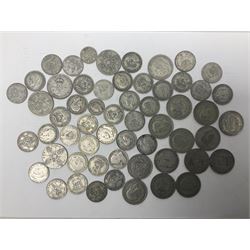 Approximately 400 grams of Great British pre-1947 silver coins, including shillings, florins and sixpences