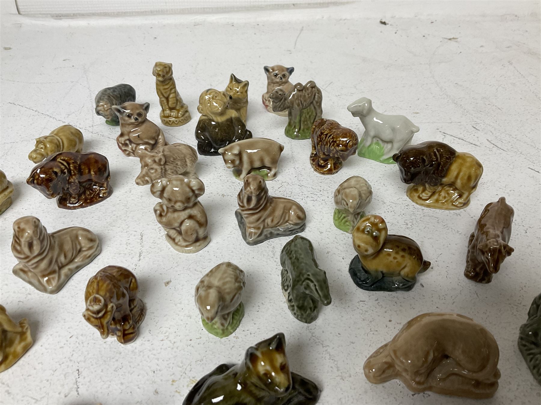 Collection of Wade Whimsies, including lions, birds, rabbits etc 