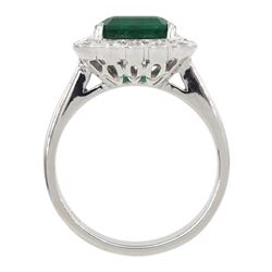 18ct white gold milgrain set emerald, round brilliant and baguette cut diamond cluster ring, stamped 750, emerald 2.98 carat, total diamond weight 1.03 carat, with World Gemological Institute Report