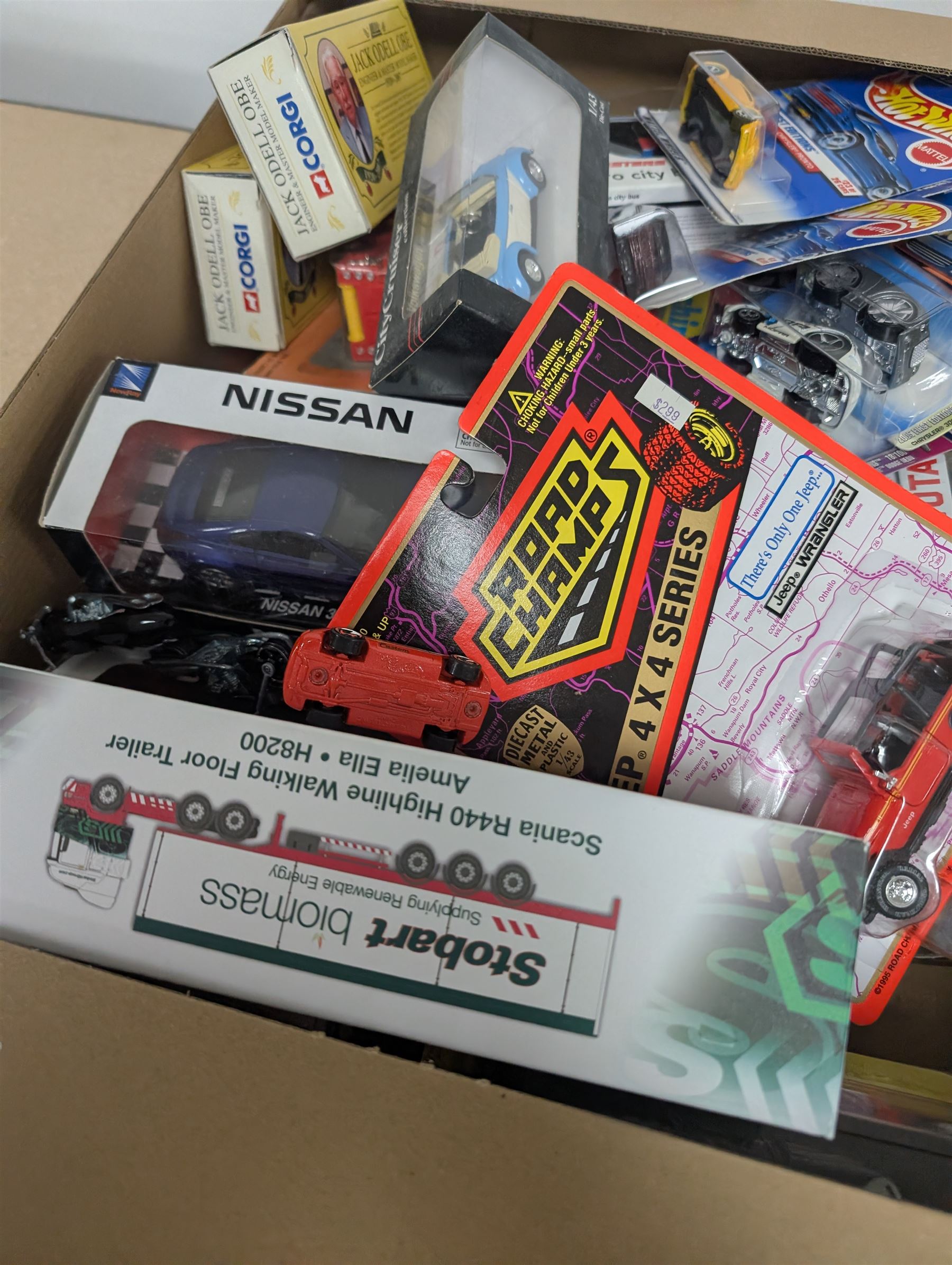 Collection of diecast model vehicles, including two Munster Koaches, Maisto Hondo S2000, NewRay cars, Hotwheels, etc