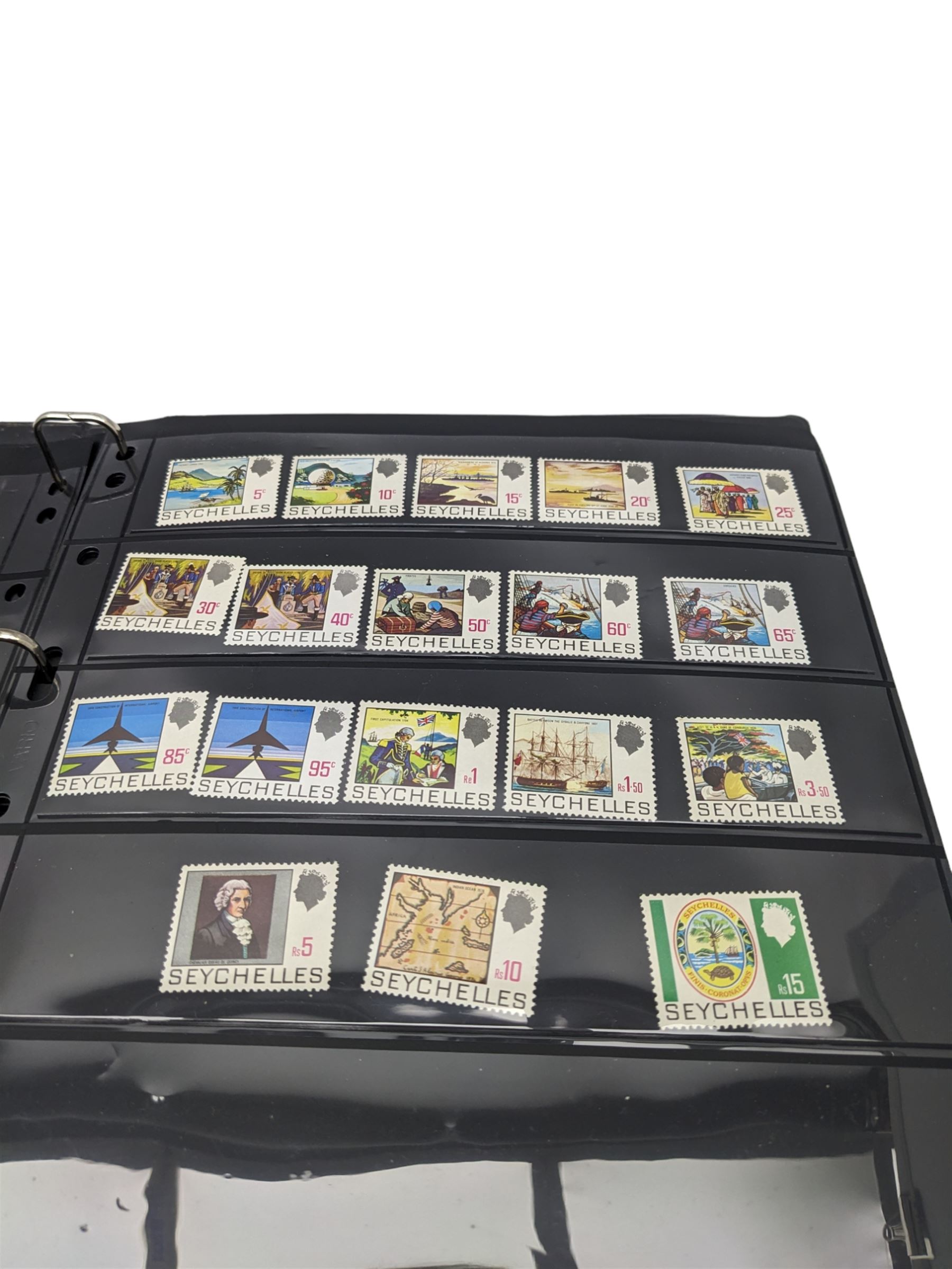 Mostly King George VI and Queen Elizabeth II Commonwealth or Empire stamps, including QEII British Solomon Islands, Pitcairn Islands, Seychelles, Sierra Leone, Mauritius, Guernsey etc, KGVI Turks and Caicos Islands, Falkland Islands Dependencies etc, mixture of mint and used values with some higher values