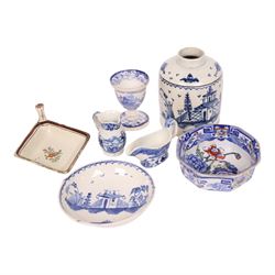 Group of 18th and 19th century ceramics, comprising 18th century pearlware tea caddy, if cylindrical form decorated with building and trees, H10.5cm, an 18th century blue and white pearlware saucer with similar decoration, D10.5cm, an 18th century creamware lozenge shaped boat, the interior painted with floral sprig, L12cm, and three pieces of 19th century blue and white transfer printed pottery, including a miniature jug decorated with the Playing Hoops pattern, H5.5cm, plus a Masons Bird and Flower pattern small octagonal basin, D10cm, (7)
