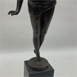 Bronzed semi nude female figure with one hand raised, upon a marble plinth, H43cm  
