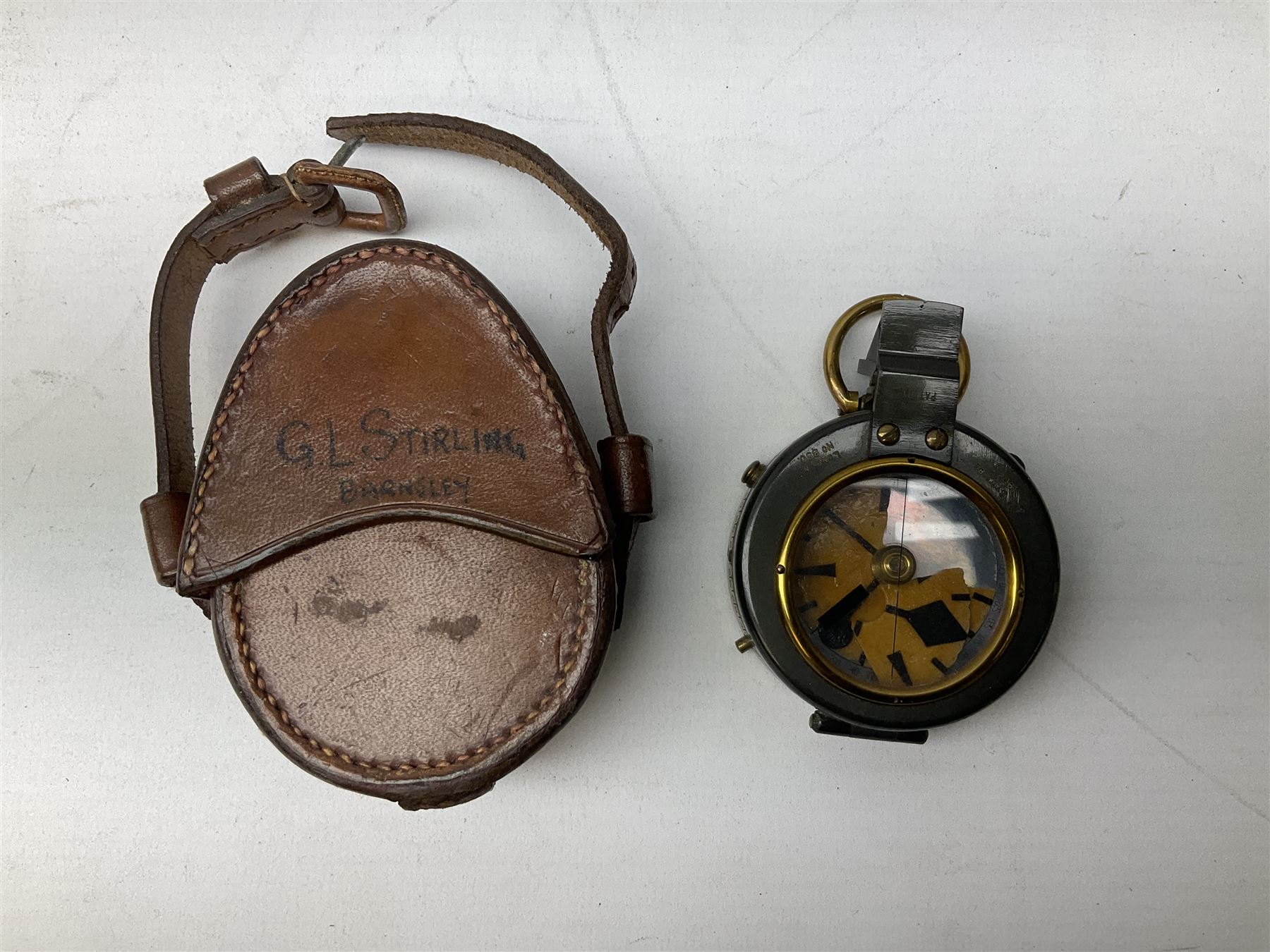 Two WW1 verniers pattern marching compasses, one dated 1917 in leather case impressed French & Son with manuscript details Major I.R. Edwards Mon. Regt., the other inscribed J.H. Steward 1903 in leather case with manuscript details G.L. Stirling Barnsley; four WW1 linen backed folding maps of Palestine and Telfit; another WW2 map of Swansea and Aberdare; and quantity of military and other postcards