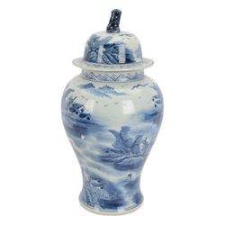 20th century Chinese blue and white jar and cover, of baluster form with domed cover with foo dog finial, decorated with waterside landscape scene with huts upon islands and figures in boats, H45.5cm