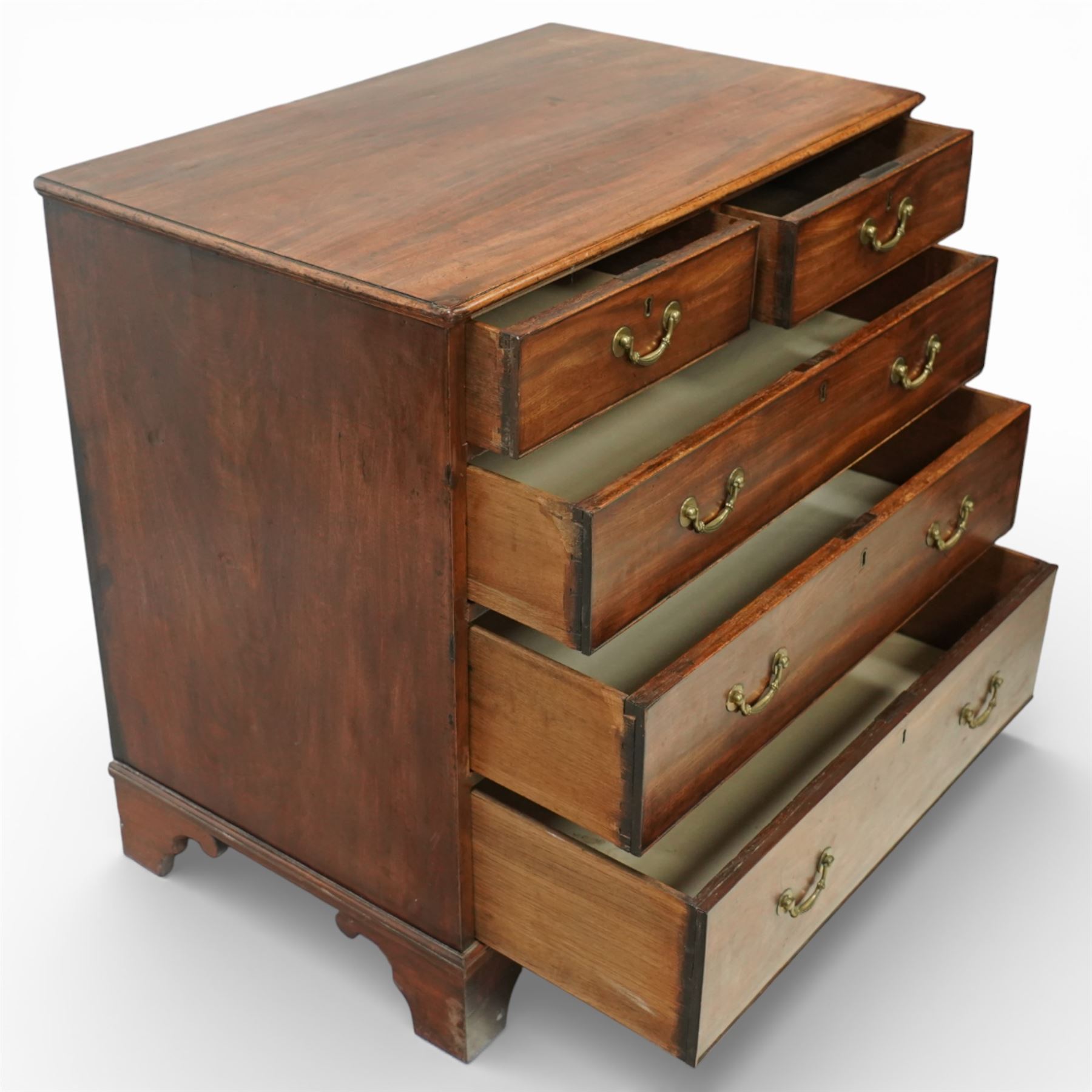 George III mahogany chest of drawers, moulded rectangular top over two short and three long drawers, plain frieze, the drawers fitted with brass swan neck handles and pierced escutcheons, raised on shaped bracket feet