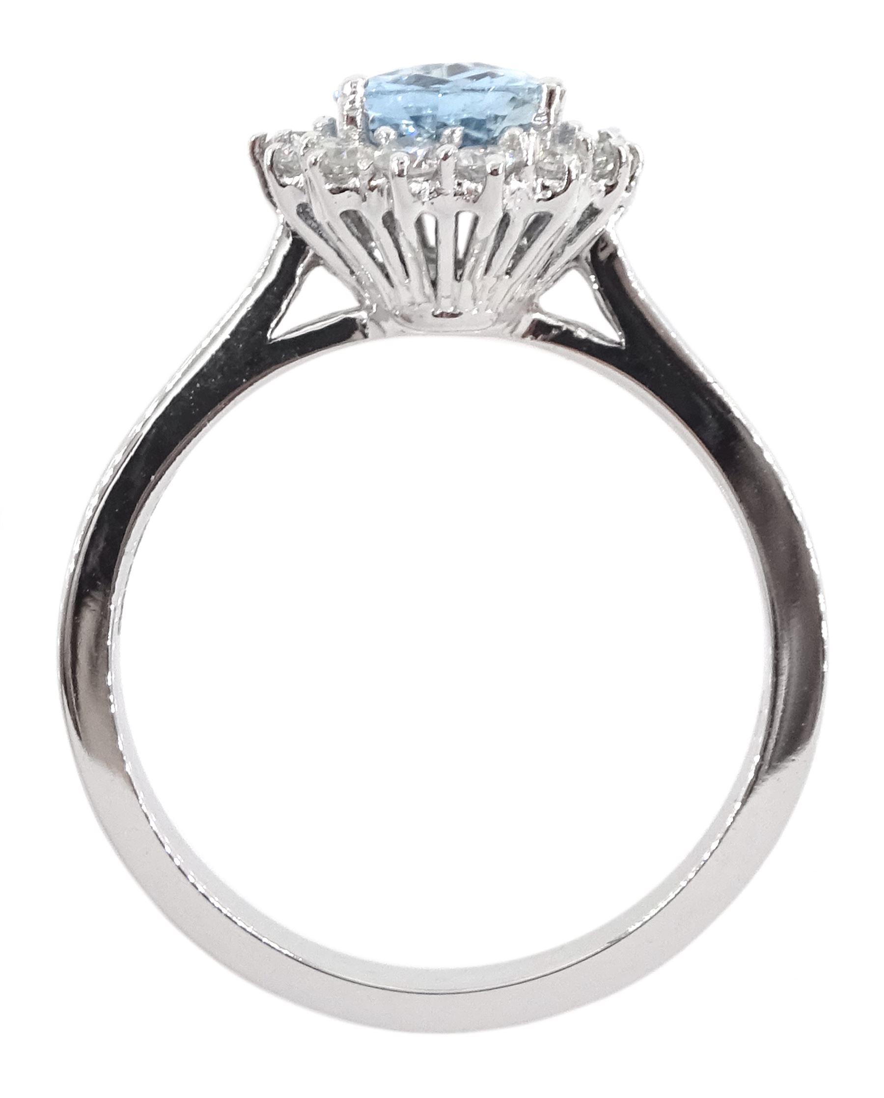 18ct white gold oval aquamarine and round brilliant cut cluster ring, hallmarked, aquamarine approx 1.05 carat, total diamond weight approx 0.40 carat