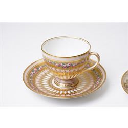 Brown-Westhead, Moore & Co cabinet cup and saucer, with rope twist moulded handle, hand-painted with floral reserves against a white and sky blue ground, heightened profusely with gilt, together with a pink hand-painted example, and a 19th century spill vase and twin-handled covered sucrier (4)