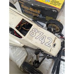 Tamiya 'The Grasshopper' 1:10 scale remote control car, boxed, together with an Acombs Techniplus-a controller, both boxed