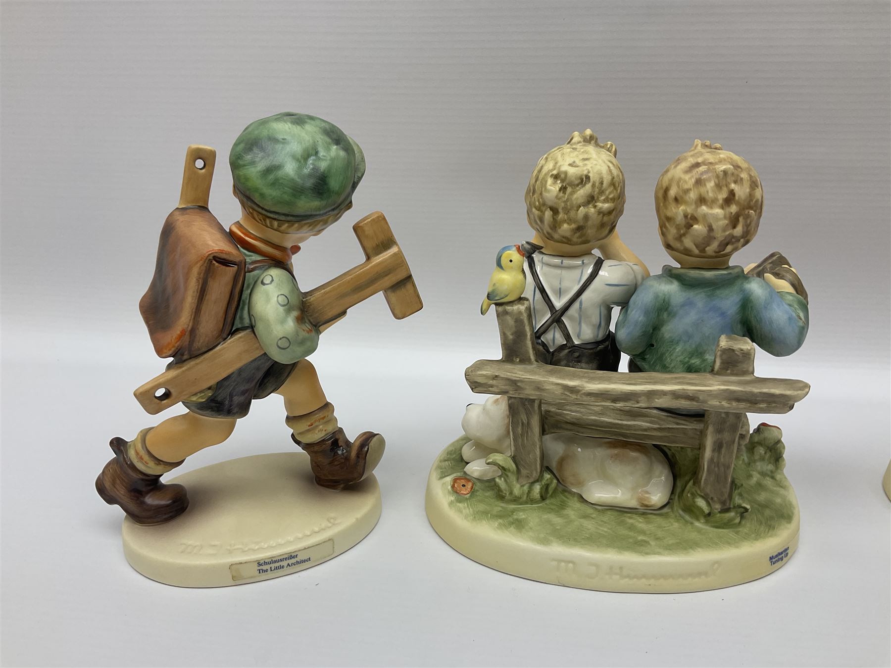 Twenty five Hummel figures by Goebel, to include Tuning up, Blessed Event, Book Worm, The Little Architect etc 