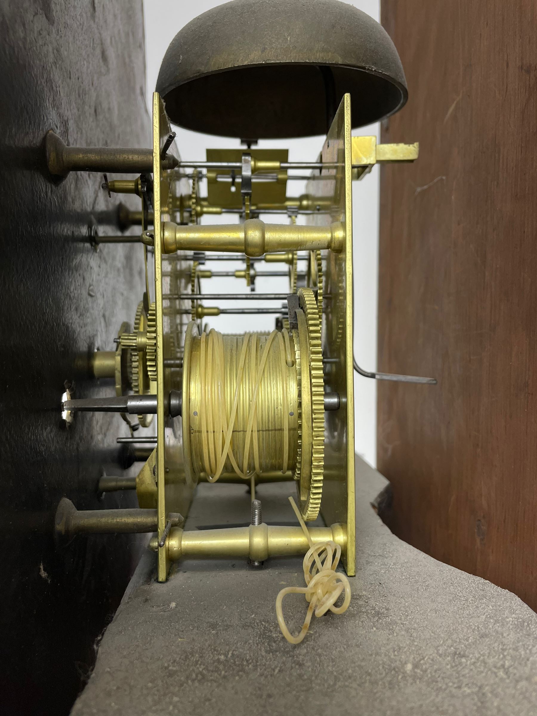 Samuel Ritchie of Forfar - William IV 8-day Scottish longcase clock in a mahogany case, with a swans neck pediment, brass paterae and three ball and spire brass finials, case and trunk inlaid with satinwood stringing on a plinth raised on decorative bracket feet, painted break arch dial depicting a costal scene to the break arch and conch seashells to the spandrels, Roman numerals, subsidiary seconds and date dials with matching steel hands, with a rack striking movement striking the hours on a bell. With weights, key, and pendulum.  Samuel Ritchie is recorded as working in Forfar 1800-37.