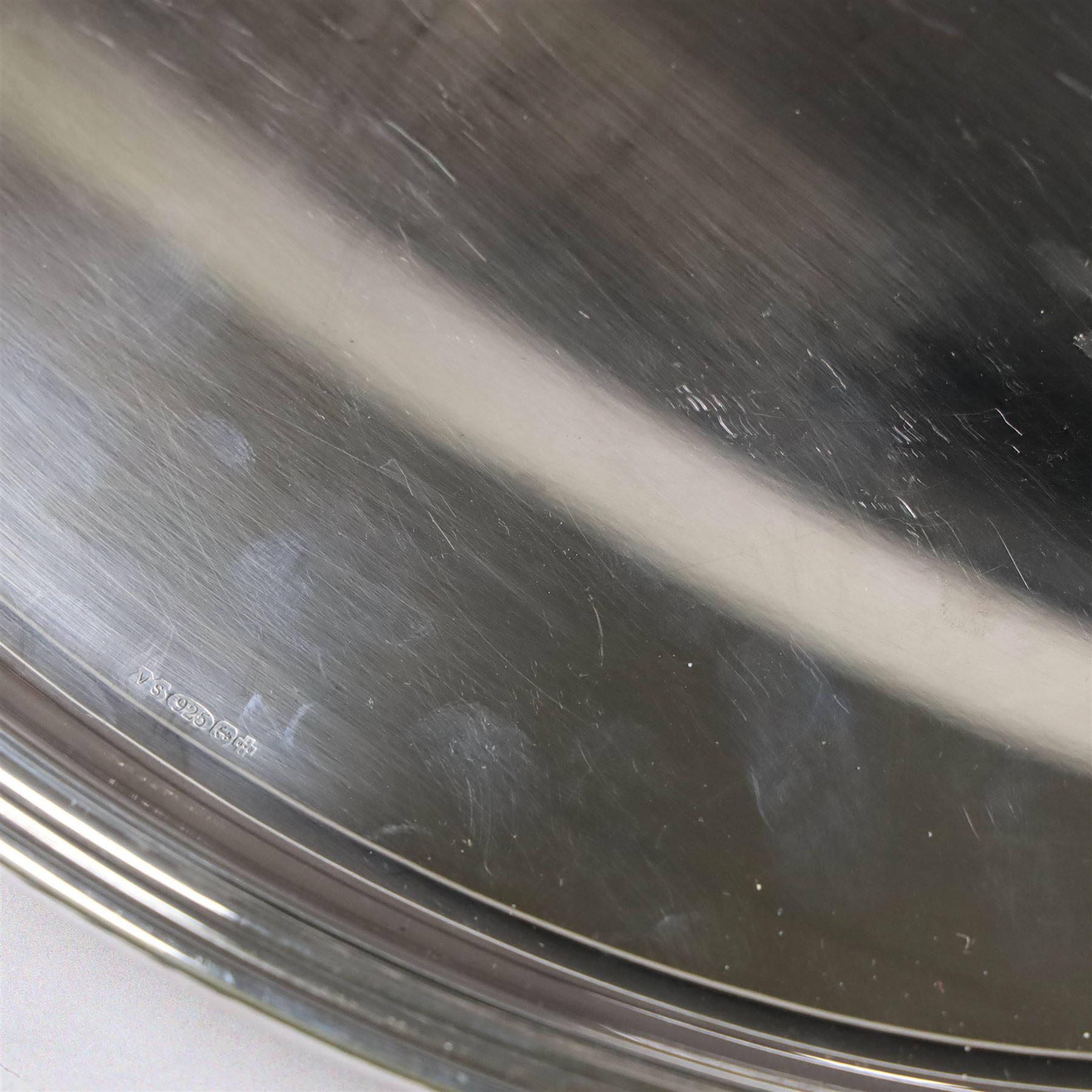 Modern silver tray, of oval form with stepped rim and upon four pad feet, hallmarked Victorian Silverware Ltd, Birmingham 2000, W28.5cm