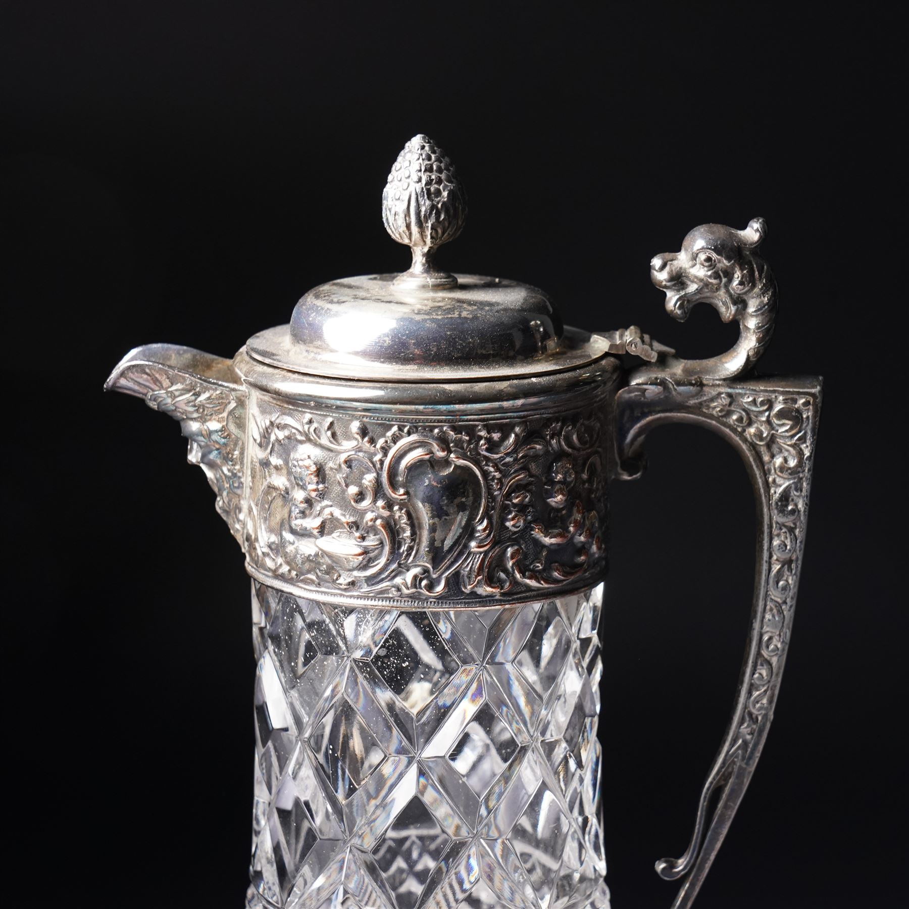 Square glass scent flask with silver collar and facet cut stopper Birmingham 1990, another and a glass claret jug with plated mounts