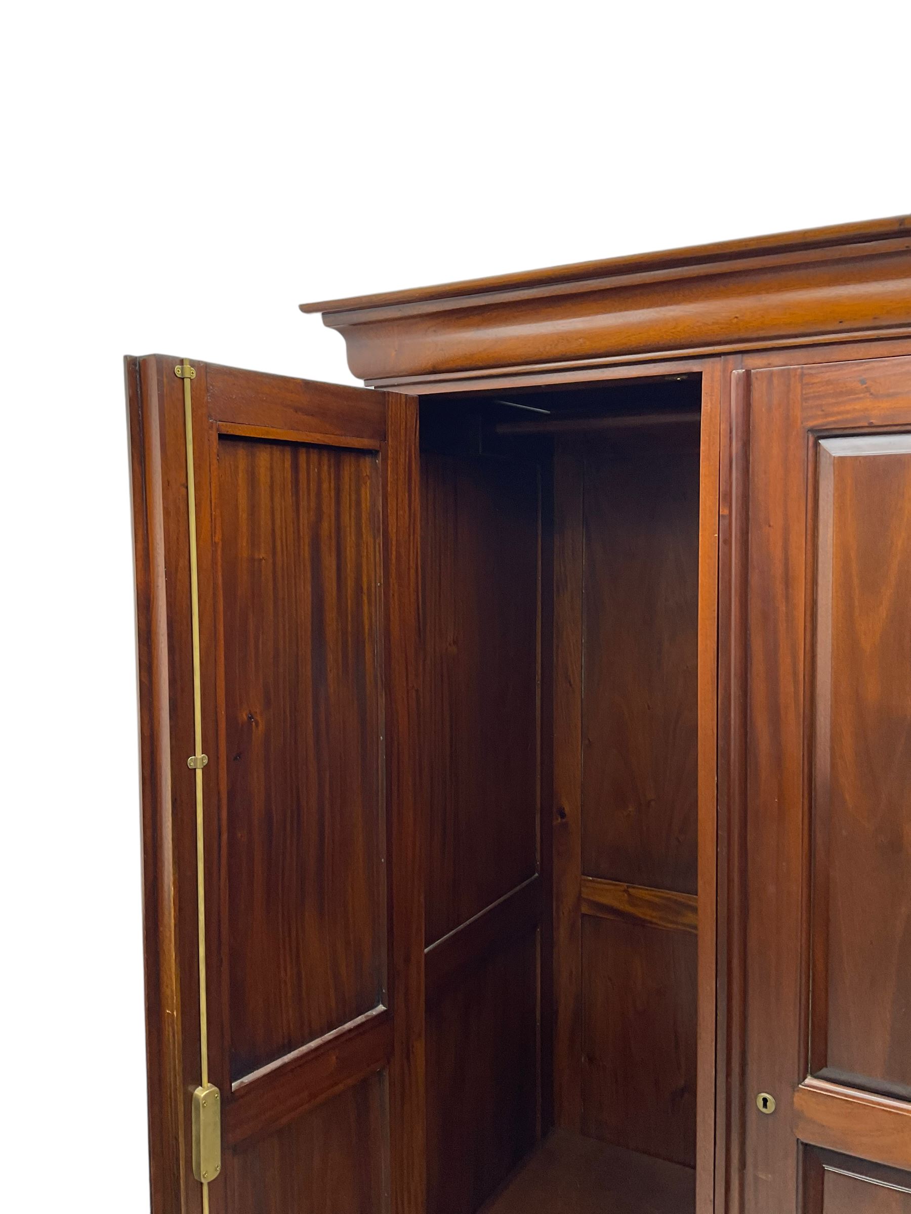 Barker & Stonehouse - 'Grosvenor' mahogany double wardrobe, projecting cornice over two panelled doors and panelled sides, on bracket feet