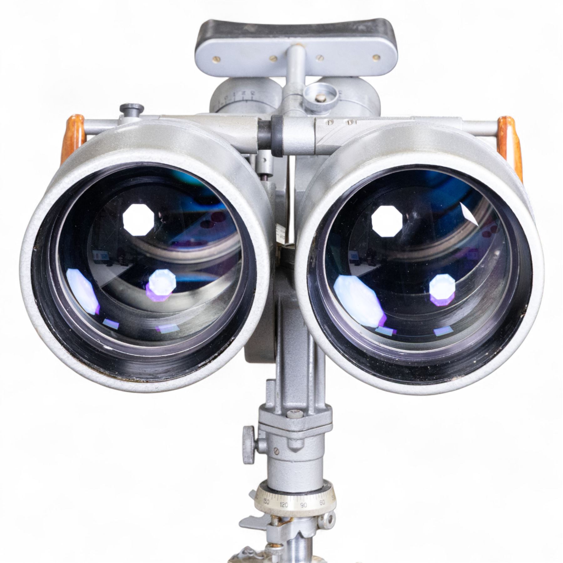 Pair of mid 20th century Russian Helios PNB-2 military observation binoculars, no. 40149, each 'Big Eye' lens 13cm in diameter, with 80 degrees vertical elevation, 360 degrees rotation, spirit level to centre of body, contained in wooden stow case with service manual, canvas cover, two lens caps, a small latched metal tin containing lenses and accessories and on adjustable wooden tripod painted green with pointed feet,  with a small latched metal tin containing eight lenses and accessories