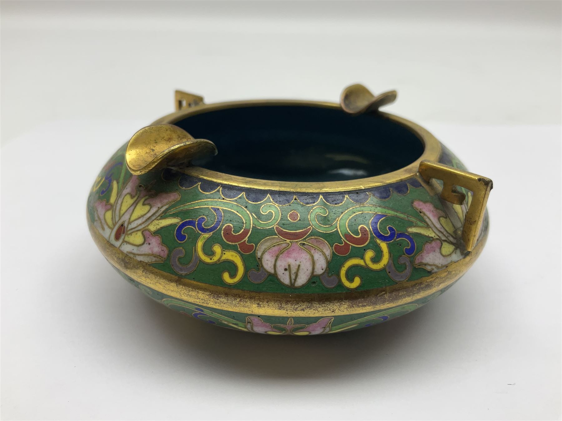 20th century Chinese cloisonne enamel smoking set, comprising two ashtrays, box and tray, with floral and foliate scrolling on green ground