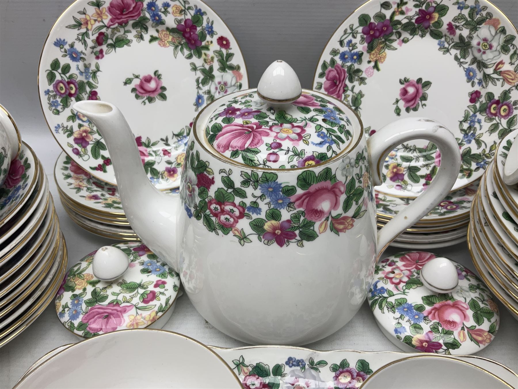 Crown Staffordshire Thousand Flowers pattern part tea service, to include teapot, two open sucriers, eighteen cups, fifteen saucers etc (57)