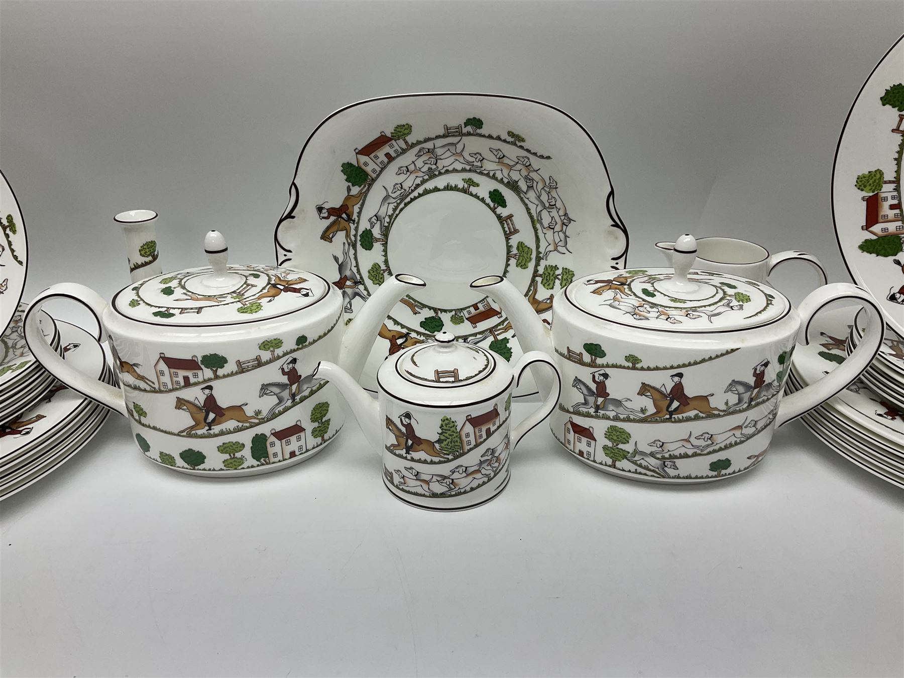 Wedgwood Hunting Scenes dinner and tea service for ten, to include dinner plates, side plates, dessert plates, cups and saucers, mugs, two large teapots, two milk jugs, etc, together with matching items by coalport and Staffordshire (94)