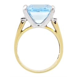 14ct gold aquamarine and diamond ring, emerald cut aquamarine with four baguette cut diamonds set either side, stamped 14K 585, aquamarine approx 6.55 carat
