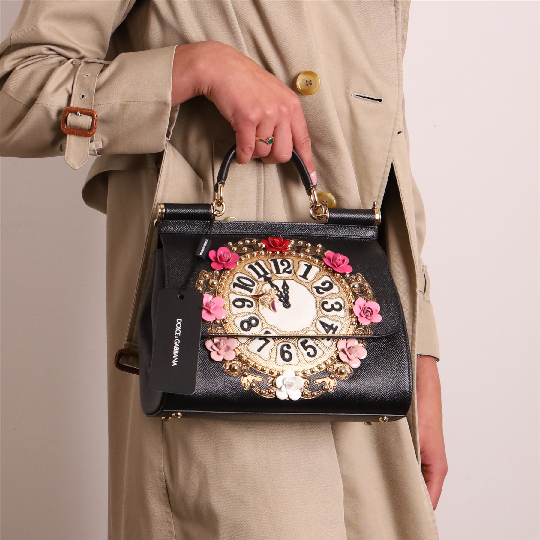 Dolce & Gabbana - 'Sicily Clock’ Medium Bag, from the Fairytale collection (Autumn/Winter 2016), in structured black textured leather, the front elaborately applied with a jewelled clock-face motif and floral embellishments, with top handle and detachable shoulder or crossbody strap, a limited production piece, unused with original box and dust bag