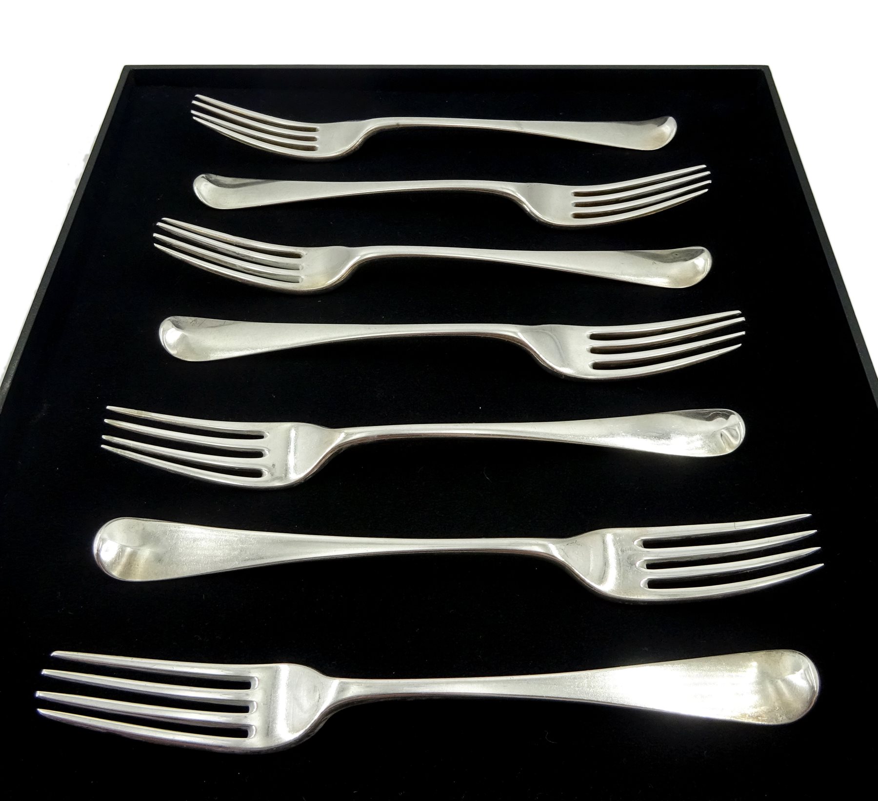 Five George III silver dinner forks, Old English pattern by Richard Crossley, London 1800 and two other similar forks London 1792 and 1817, approx 15.2oz (7)