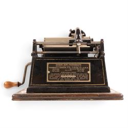 Early 20th century Edison GEM phonograph, in oak case, serial number 237880, with brass horn and a collection of wax cylinders