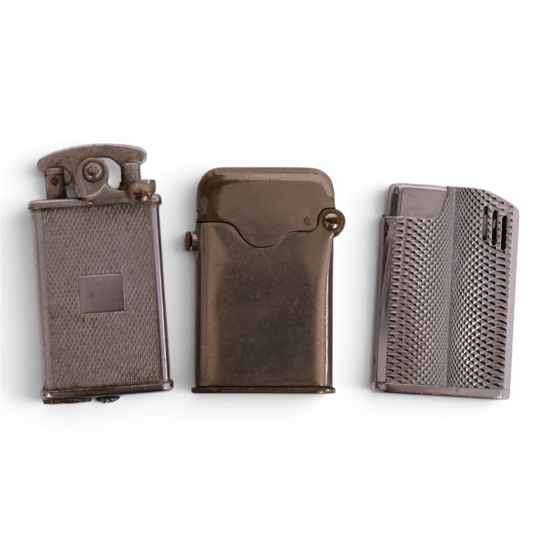 Collection of lighters including Parker Roller Beacon, Dunhill lift arm lighter. Patent no. 390107, Orlik Sport and three others 