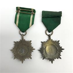 WW2 German Eastern Peoples Bravery and Merit Star 2nd Class 'silver' with swords; and another 2nd Class bronze; both with ribons (2)