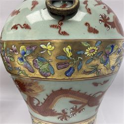 Pair of early 20th century Chinese vases decorated with dragons chasing a flaming pearl, with a gilt border of butterflies and floral sprigs, with Elephant head handles, H44cm 