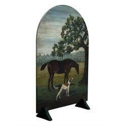 Late 20th century firescreen with arch top, hand-painted to show an equine and canine in a parkland setting with a stately home beyond, standing on green-painted feet