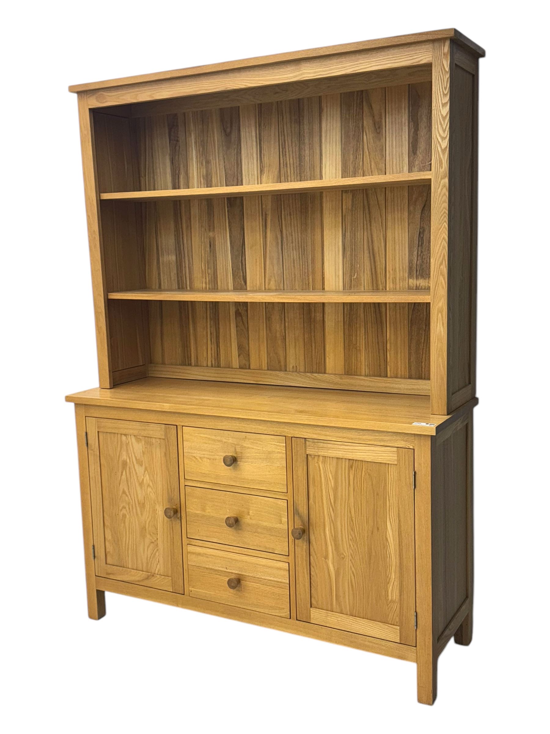 Oak kitchen dresser, raised two-tier back over three drawers and double cupboard
