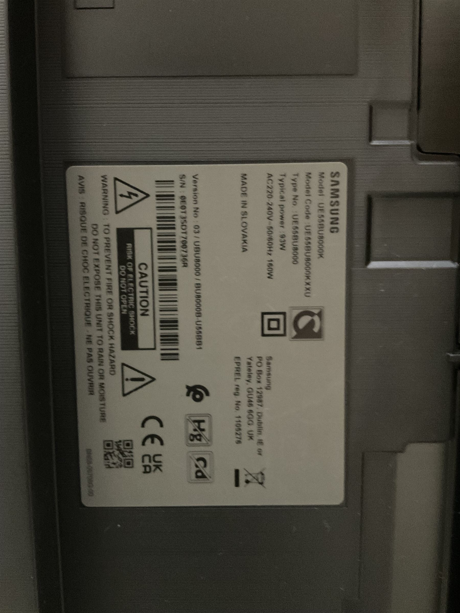 Samsung UE55BU8000K smart TV with accessories and stand  