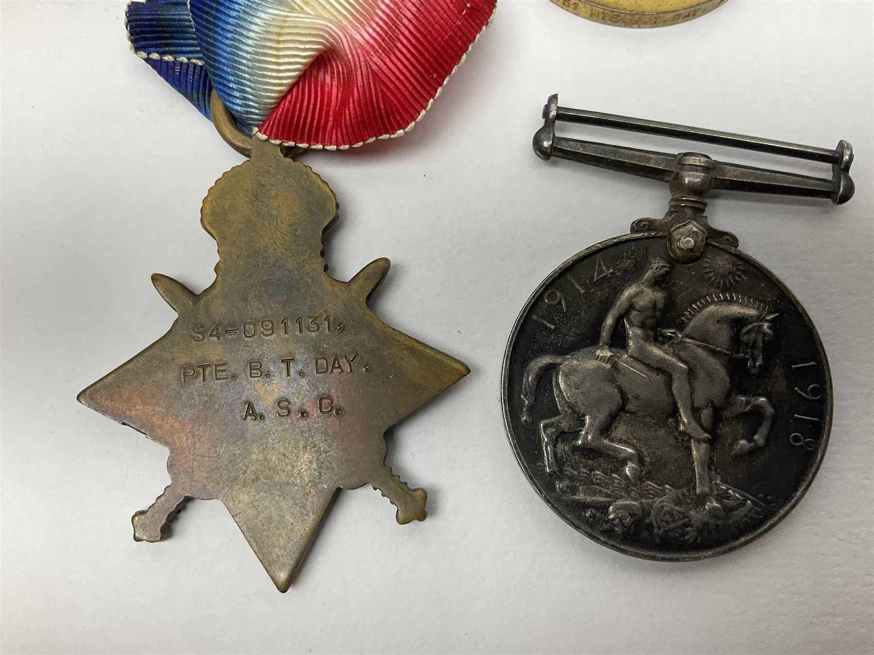 WW1 trio of medals comprising British War Medal, Victory Medal and 1914-15 Star awarded to S/4 091131 Pte. B.T. Day A.S.C.; and WW1 pair of medals comprising British War Medal and Victory Medal awarded to 240653 Gnr. E. Stephenson R.A.