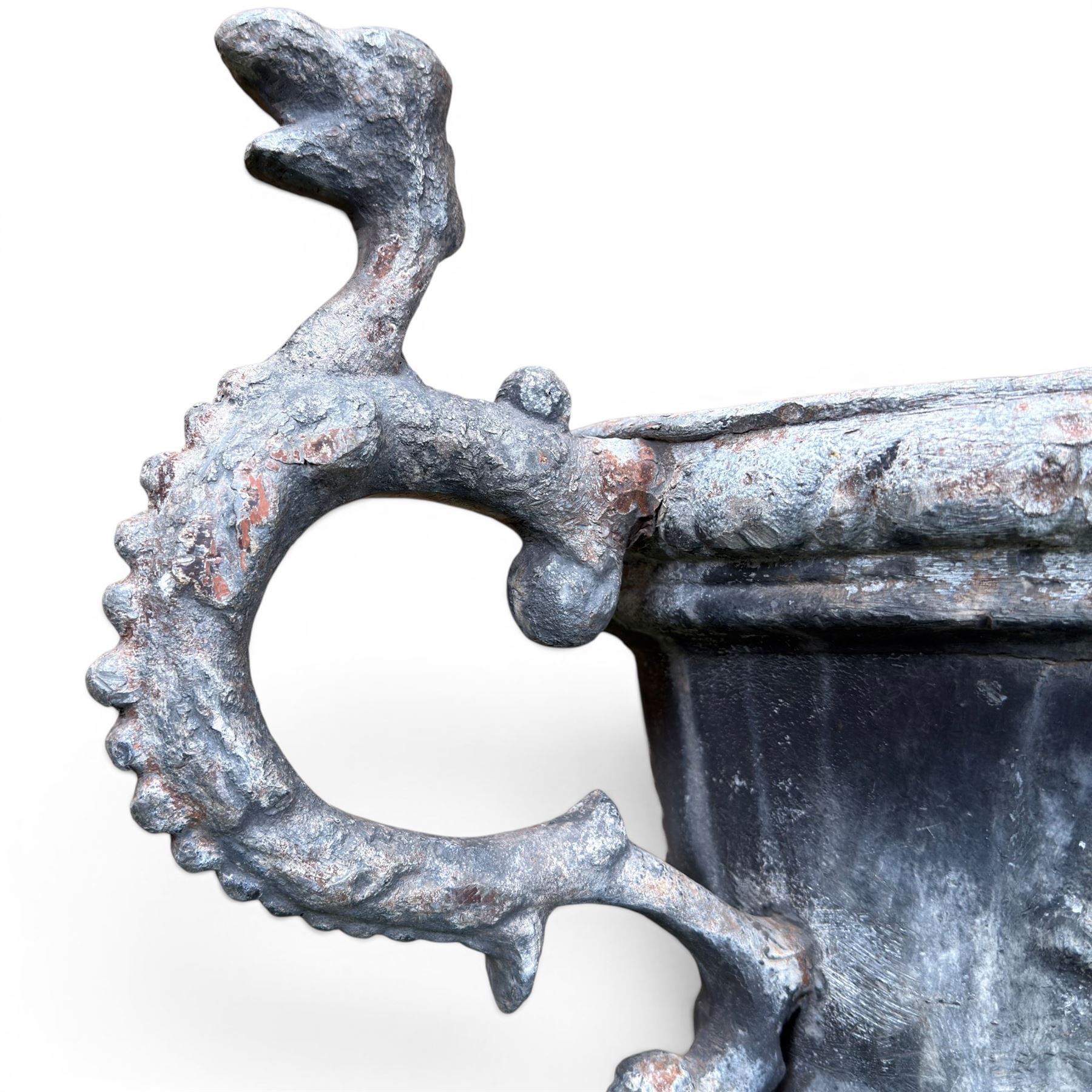 Impressive pair of early highly decorative lead garden urns, griffin handles with ornate decoration depicting cherubs and laurel wreath