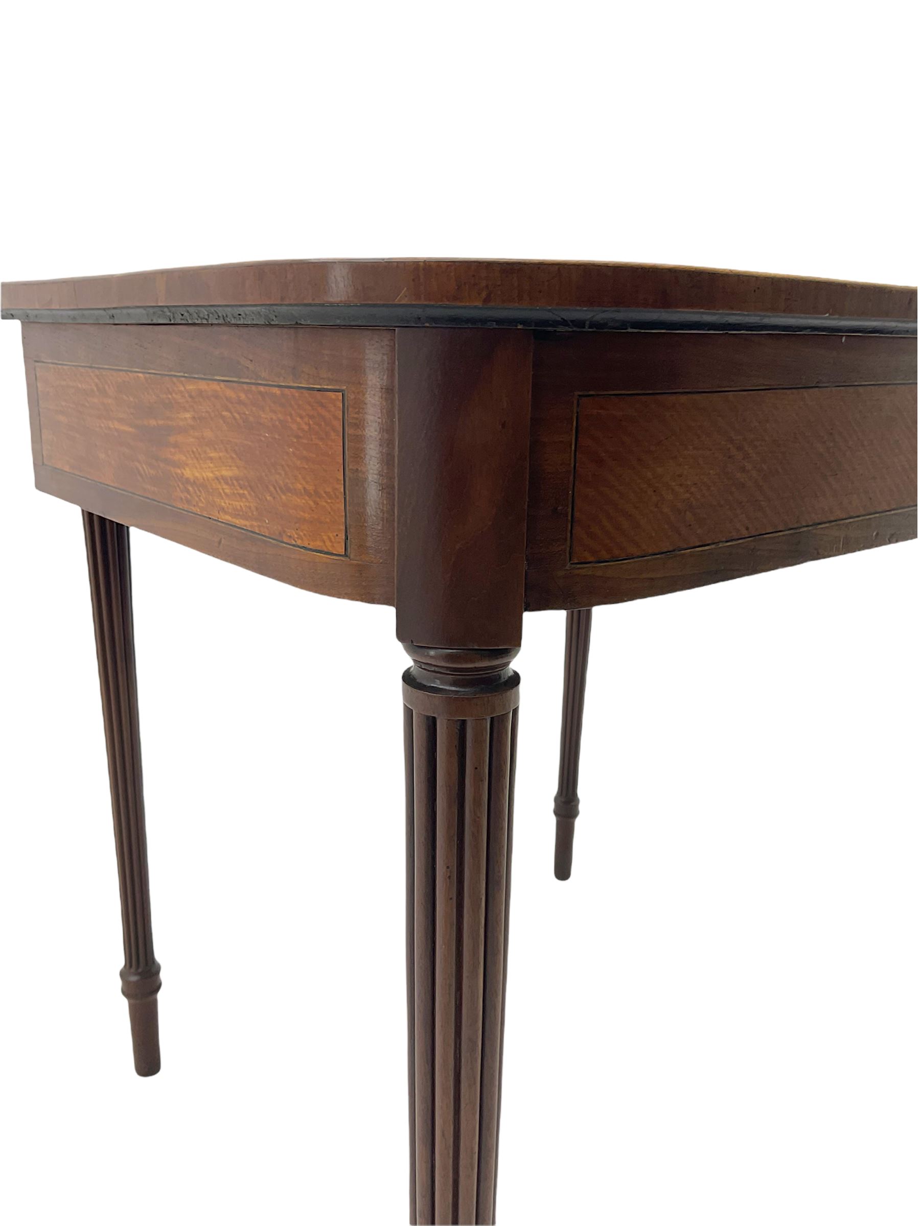 Early 19th century tea table, rectangular fold-over top with rounded corners, the frieze and sides inlaid with satinwood panels, double gate-leg action base, on reeded supports 