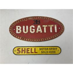 Bugatti cast iron sign with a red background, Shell Oil cast iron sign with gold background, together with Land Rover oil can, motorist warning lamp & torch tool kit and other motoring items 