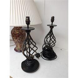 Tiffany style table lamp, with pink shade and ornate metal base, together with a ceramic table lamp, with red, green and gold decoration and fabric shade and a pair of openwork twisted metal table lamps, tallest H72cm
