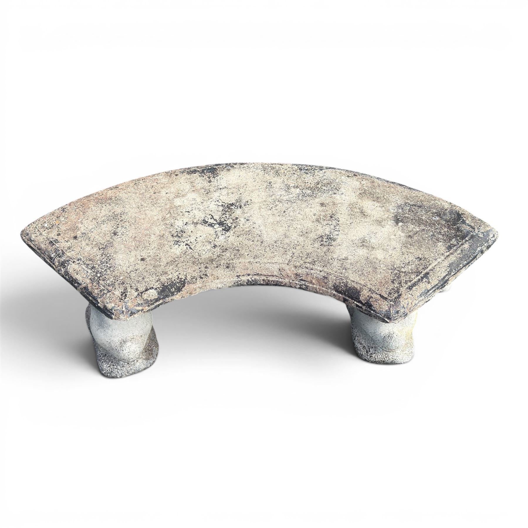 Weathered cast stone three-piece curved bench, raised on naturalist tree-stump style end supports