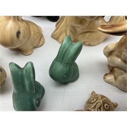 Collection of Sylvac and similar animal figures, including rabbits, hares and dogs, together with Falcon budgie vase, etc 