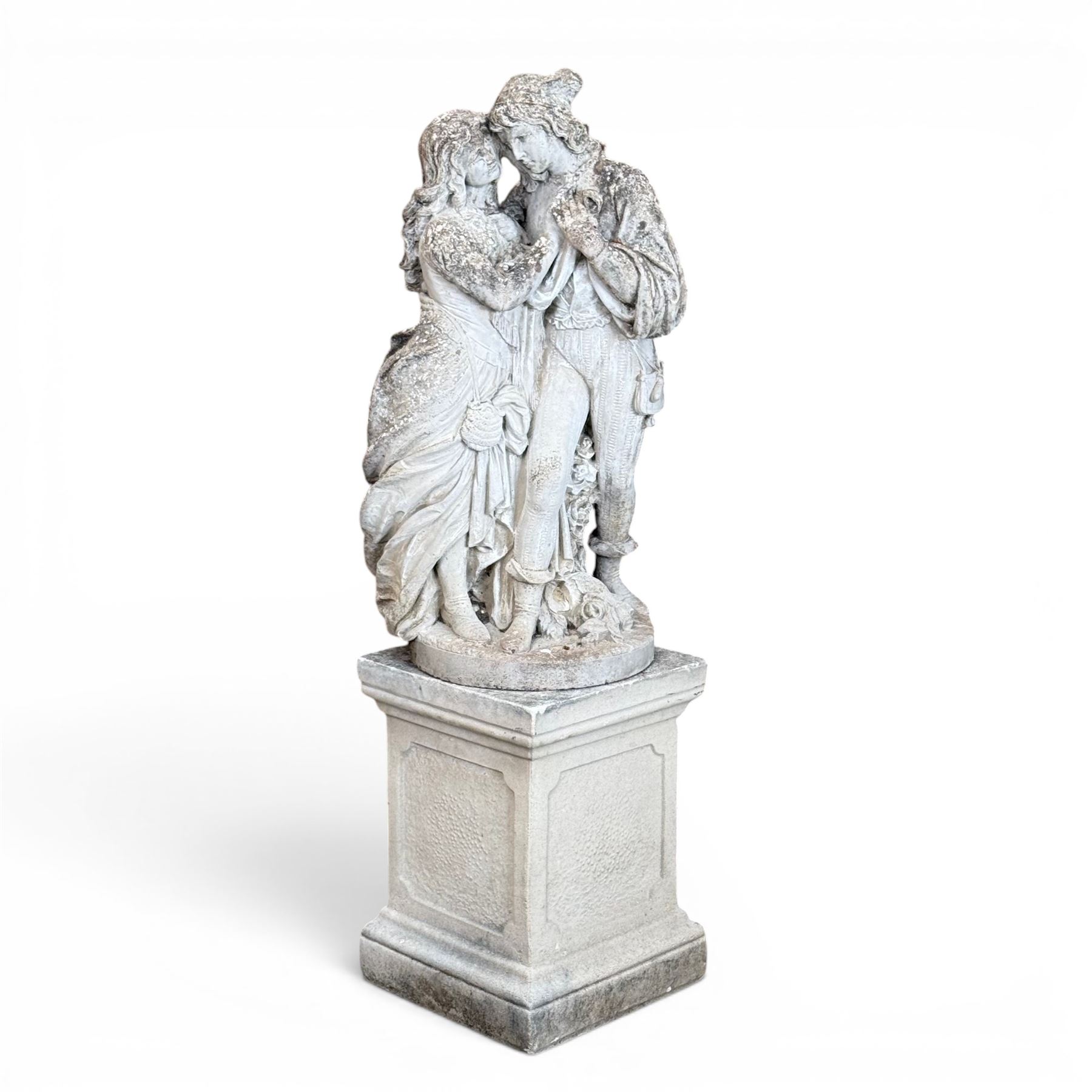 Romeo & Juliet ornate cast stone garden figure, raised on square plinth base