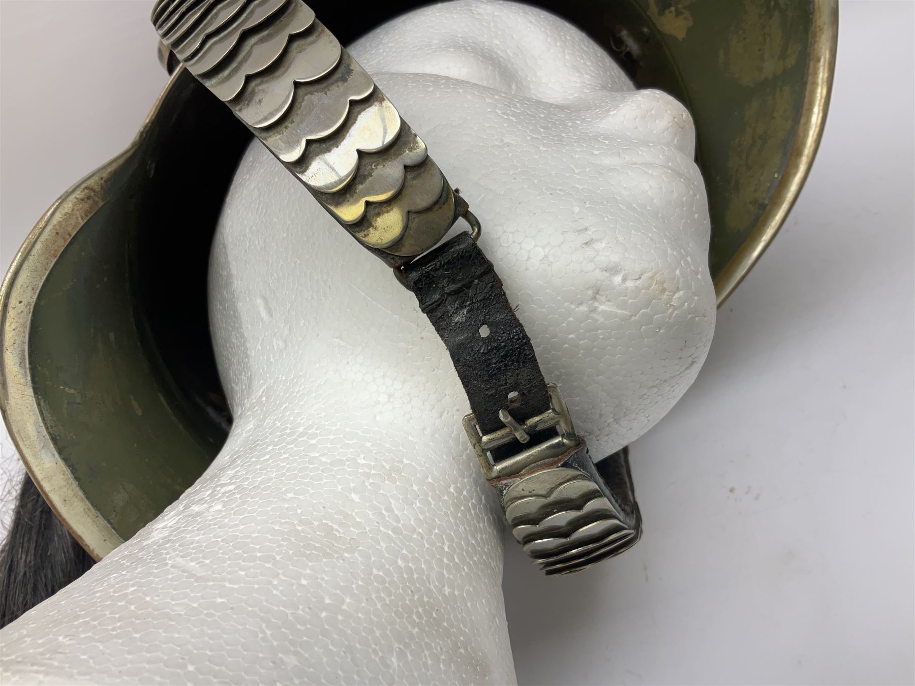 French Model 1913 mounted gendarmerie helmet; brass bodied with nickel mounts, chin strap, comb and horse-hair H27cm (no liner)