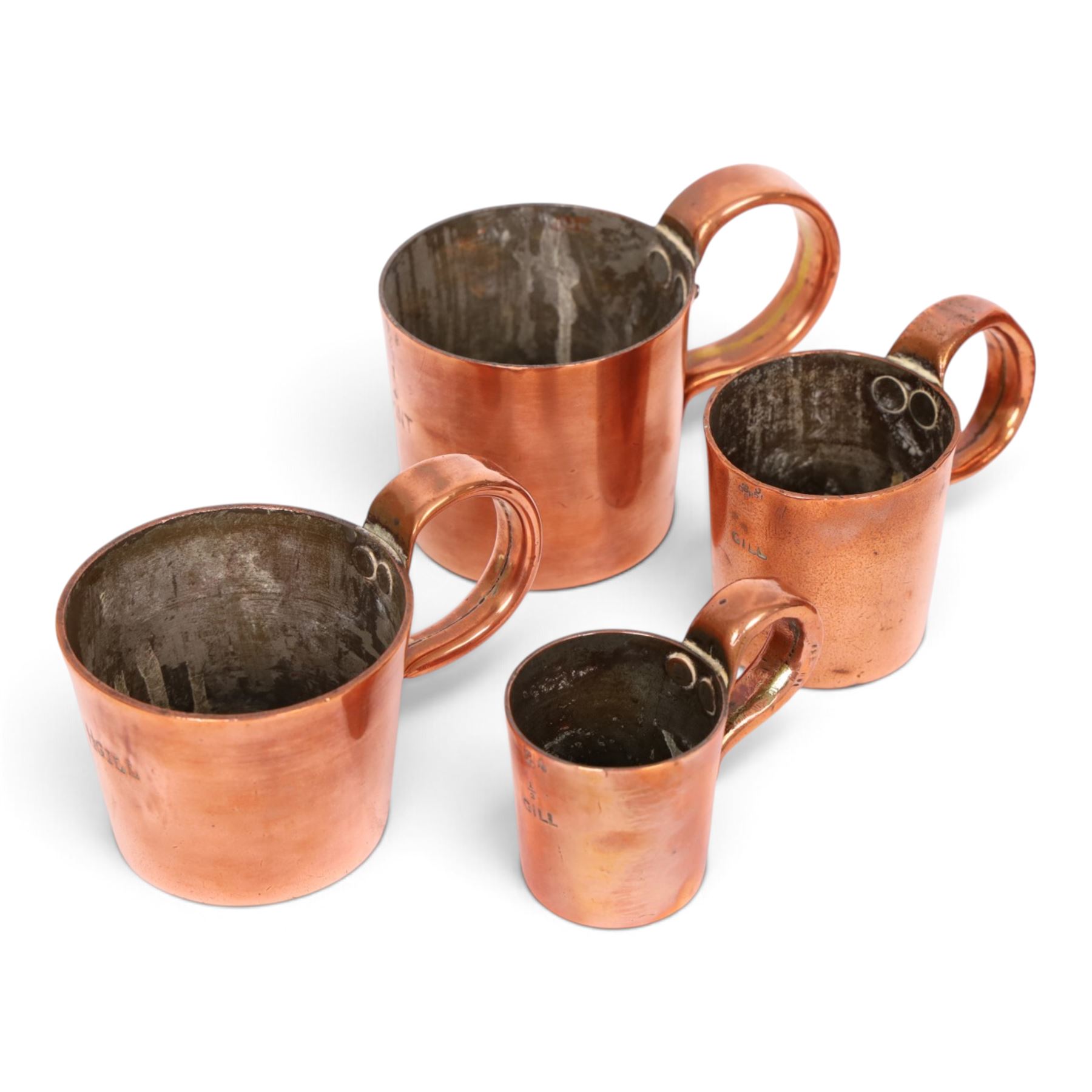 Set of six 19th century copper tankard measures comprising 1/2 Gallon, Quart, 1/2 Pint and 1 1/2 Gill, Gill and 1/2 Gill