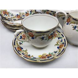 Royal Albert tea service for six, decorated with orange and yellow flowers with blue borders, gilt edging, comprising six teacups and saucers, six side plates, open sucrier and jug, teapot and hot water pot