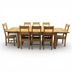 Modern light oak rectangular dining table, and eight high back chairs, stowable leaves extending to 270cm