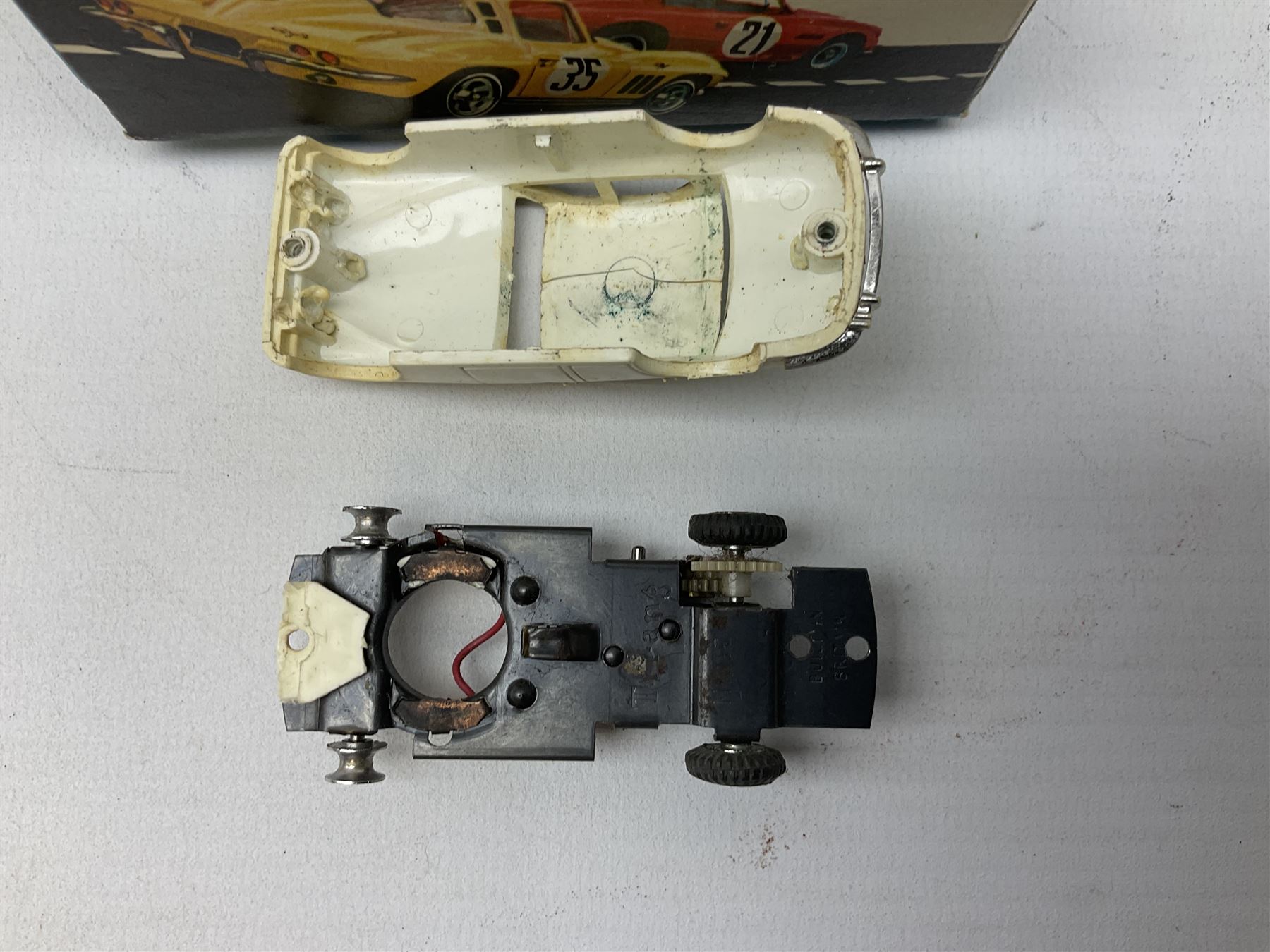 Various makers - Tri-ang Mini-Hi-Way Racing Car Series Le Mans No.9 racing car; Matchbox K-15 Merryweather Fire-Engine; Marx tin-plate Friction Helicopter; all boxed; and a Minic Motor Rally Adventure box containing a Jaguar Police car for spares or repair (4)