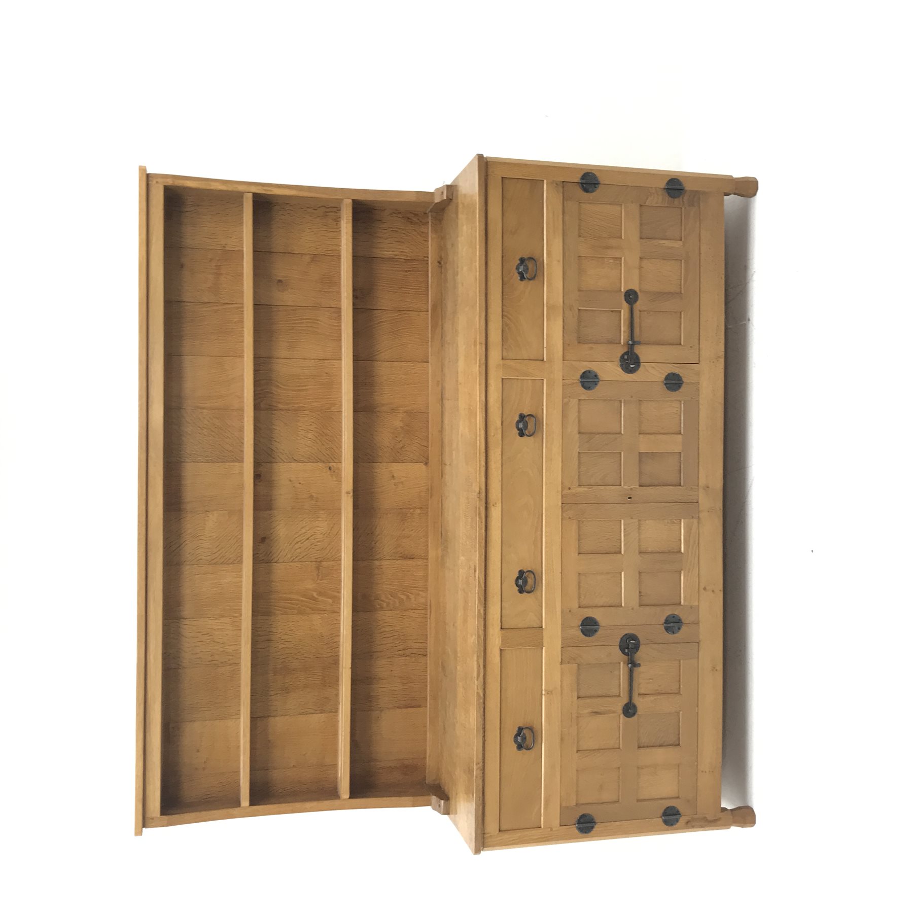'Lizardman' panelled oak dresser, two heights plate rack above base fitted with three drawers, double cupboard and two single cupboards, by Derek Slater of Crayke, W181cm, H167cm, D45cm
